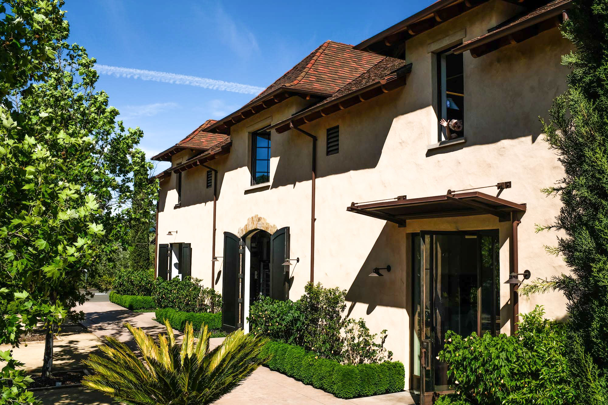 Welcome to Young Inglewood Image of the front of Young Inglewood Vineyards' winery with all of doors open on a beautiful Napa sunny day.